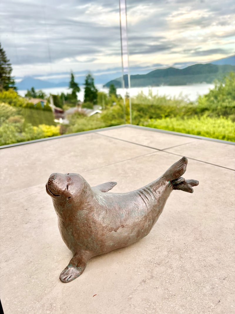 Happy Seal (on stone slab)